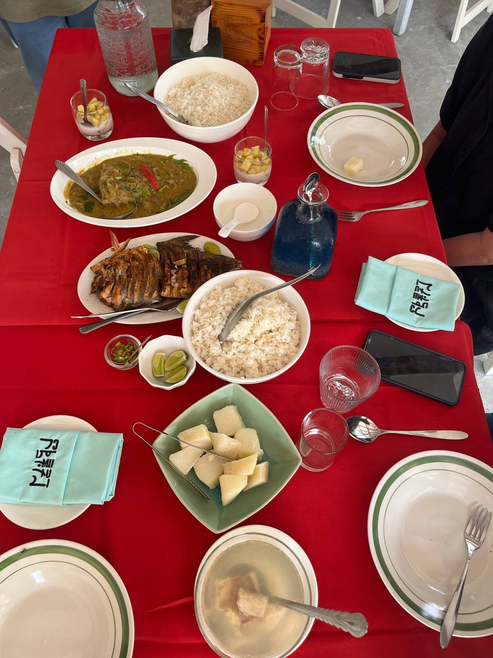 Maldivian lunch spread at Carpaccio — fish curry, grilled fish, rice, breadfruit, fresh fruit