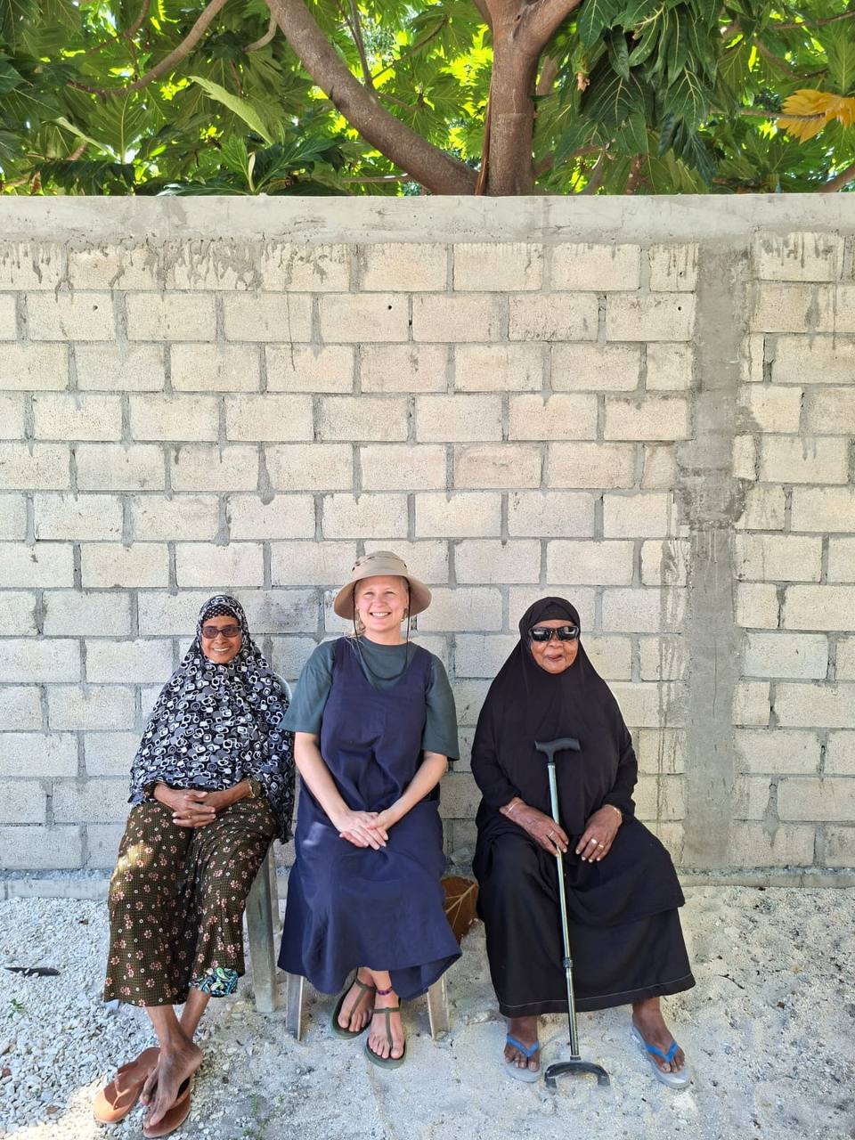 Marije sitting with two elders of Feevah, Shaviyani Atoll