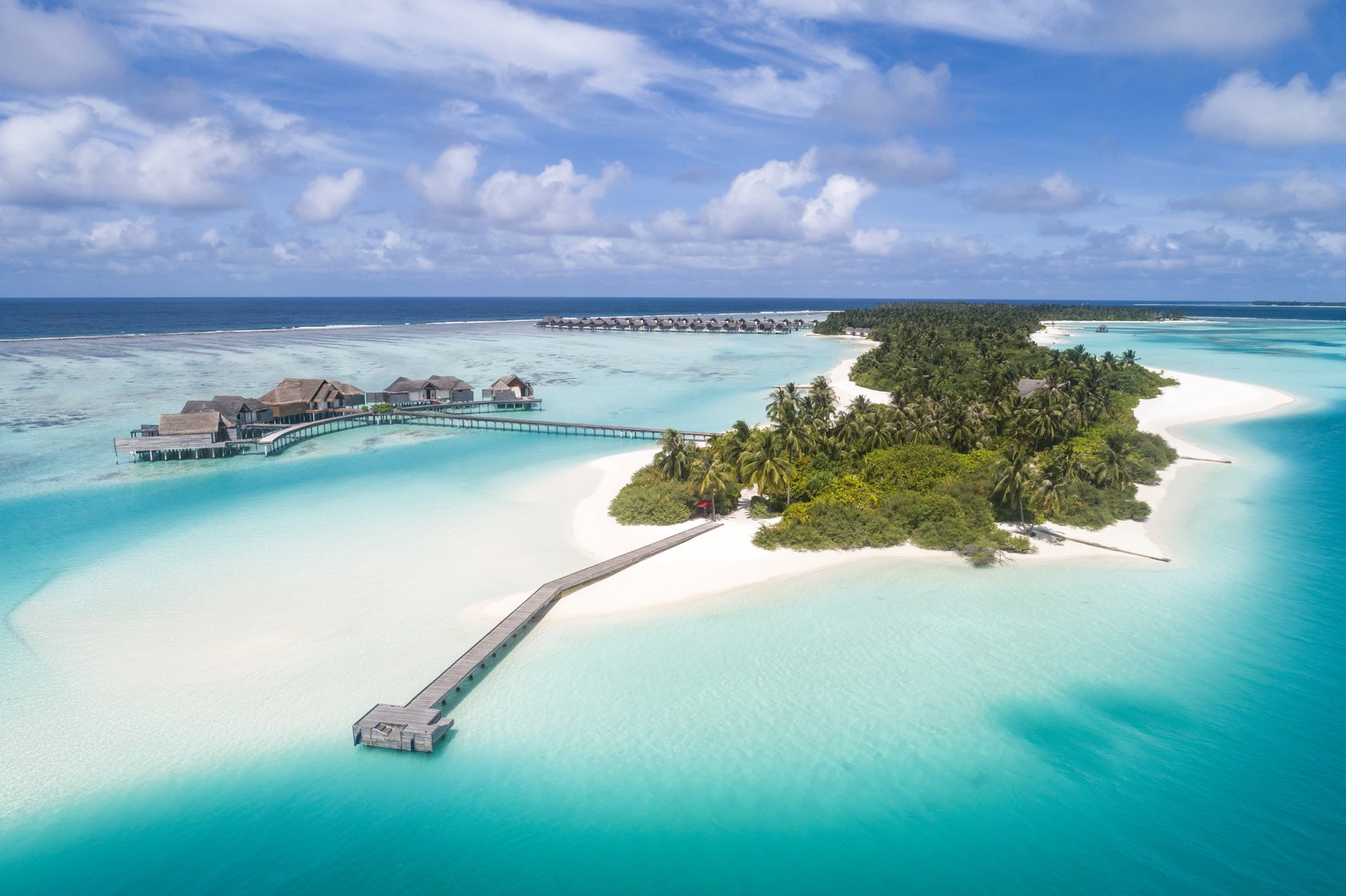 Maldives overwater villa at sunrise
