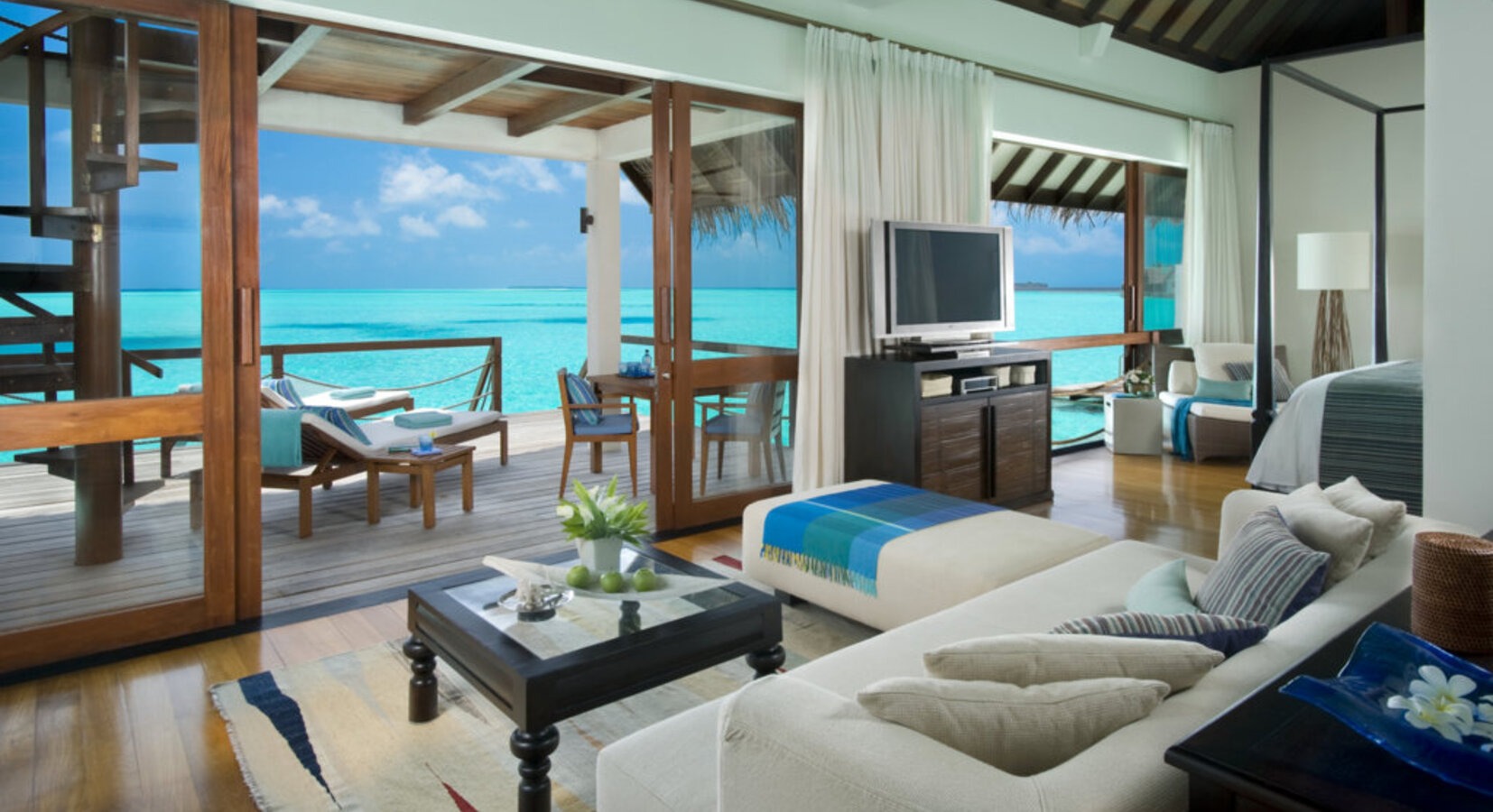 Four Seasons Landaa Giraavaru — overwater villa interior, Baa Atoll