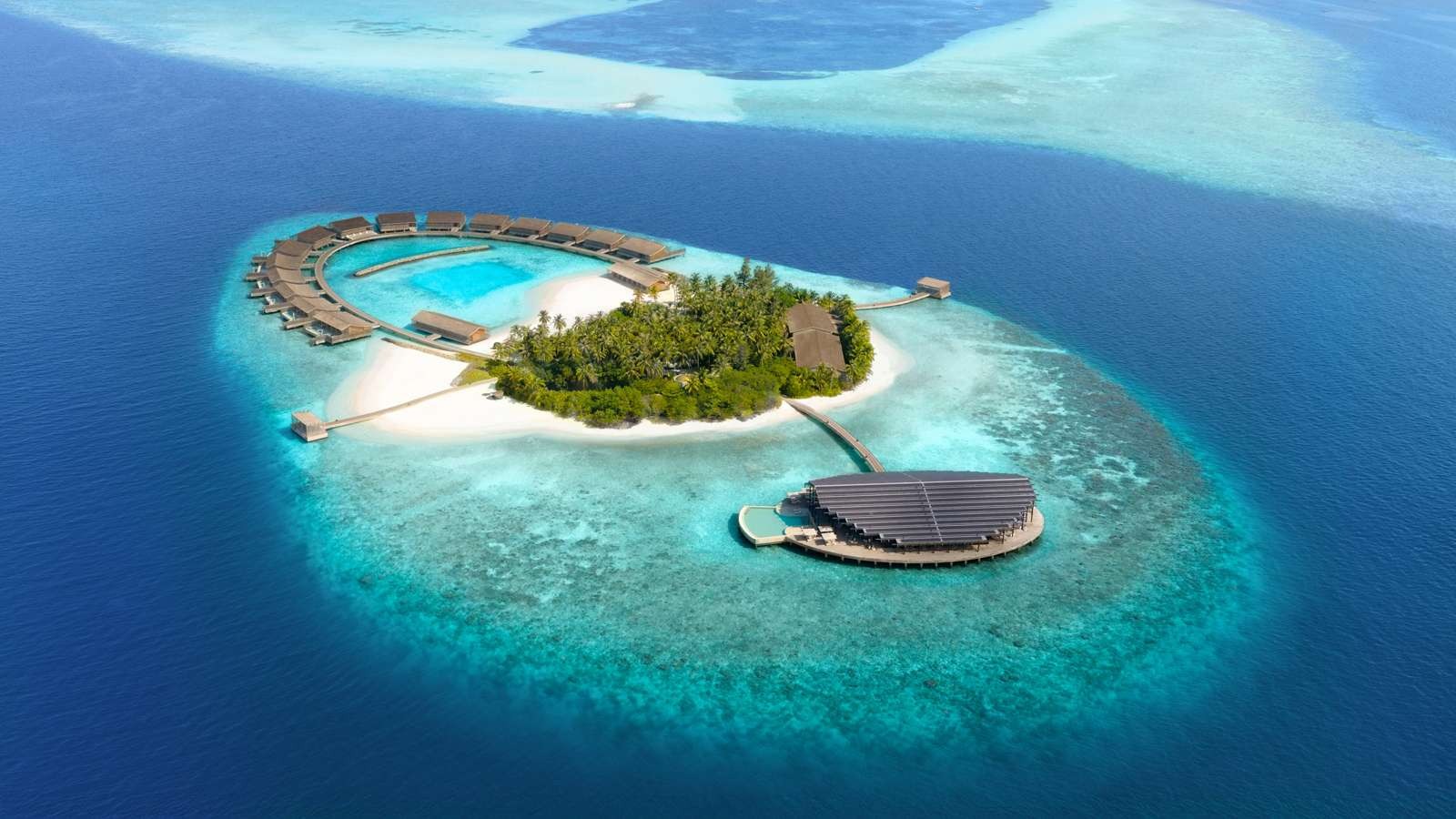Kudadoo Maldives Private Island — circular island aerial, Lhaviyani Atoll