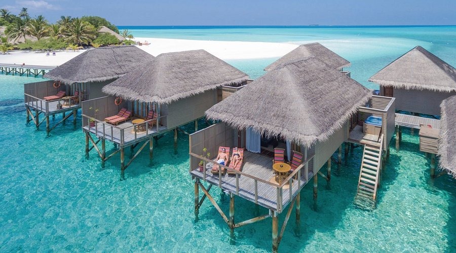 Meeru Island Resort & Spa — overwater bungalows, North Malé Atoll